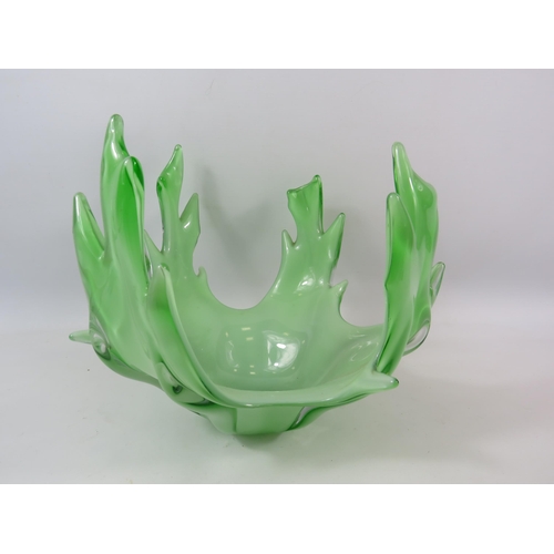 319 - Large green cased art glass bowl, 23cm tall and diameter 28cm.