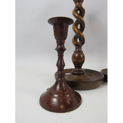 320 - Pair of Oak twisted candle sticks 25cm tall plus a pair of bronzed candlesticks 14cm tall.