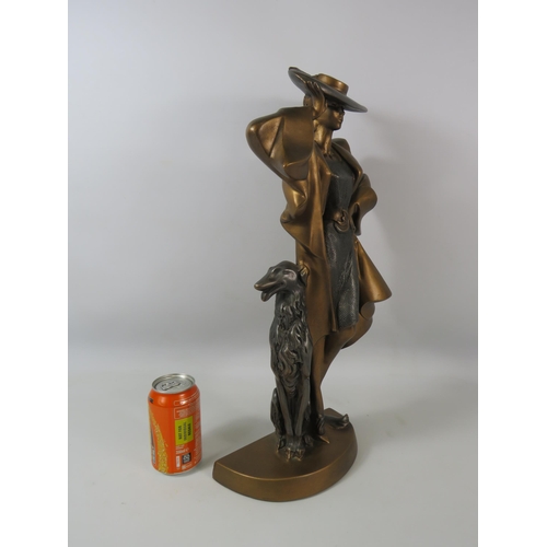 371 - Art deco style bronze metal sculpture of a lady and a Borzoi dog by Austin Sculptures, 49cm tall.