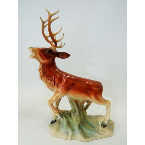 294 - Large Dutch made ceramic model of a Red Deer stag along with a leonardo model of a Hereford bull.