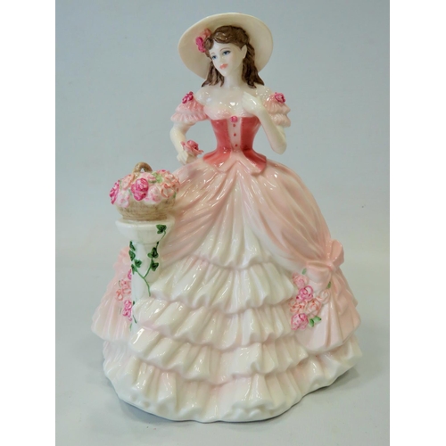 296 - Large Coalport figurine which measures approx 9 inches tall. See photos.