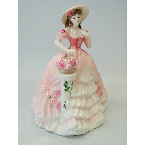 296 - Large Coalport figurine which measures approx 9 inches tall. See photos.