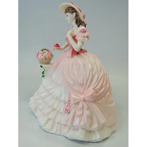 296 - Large Coalport figurine which measures approx 9 inches tall. See photos.