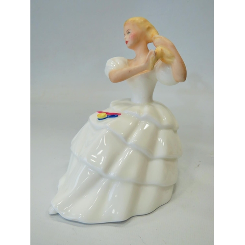 297 - Small Royal Doulton Figurine  HN2710 measures just 6 inches tall. See photos.