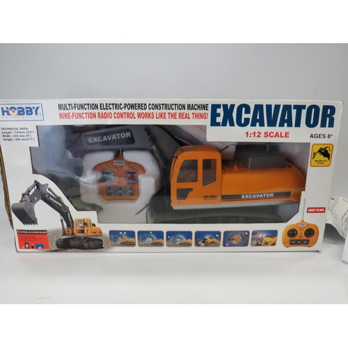 592 - Hobby Excavator in 1:12 Scale with re-chargable battery and remote control. Believed to be complete ... 