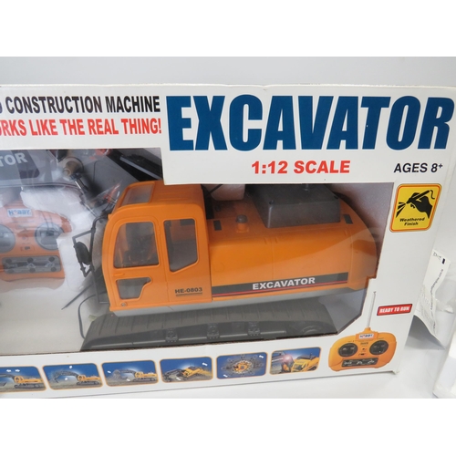 592 - Hobby Excavator in 1:12 Scale with re-chargable battery and remote control. Believed to be complete ... 