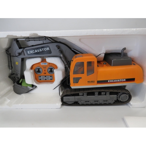 592 - Hobby Excavator in 1:12 Scale with re-chargable battery and remote control. Believed to be complete ... 