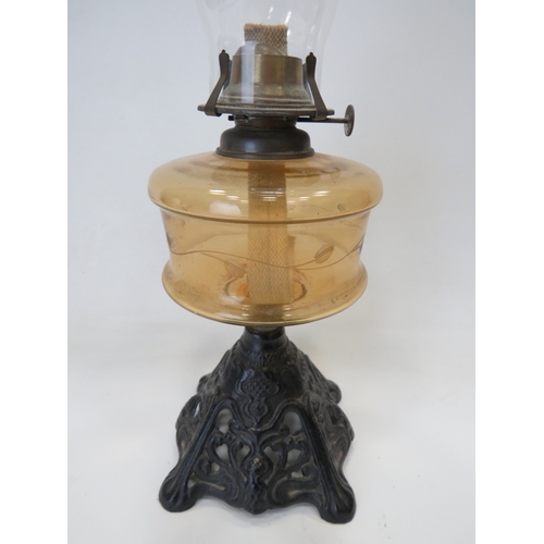 661 - Pretty Metal and glass Oil Lamp with Pierced metal base and Unranium glass reservoir with clear glas... 