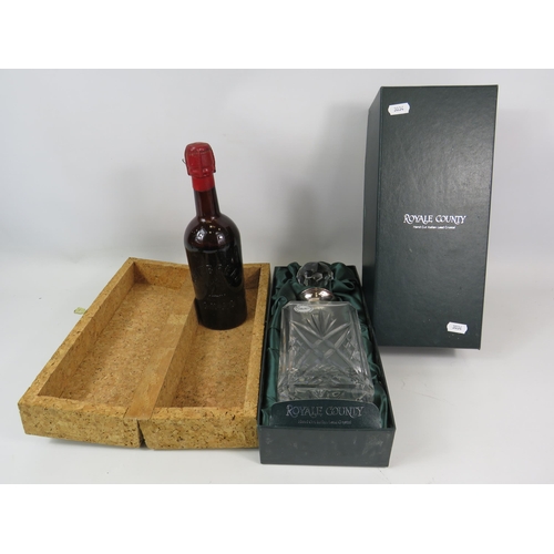 479 - Royale Country Decanter with silver plated collar and a wax sealed bottle of Whitbread.