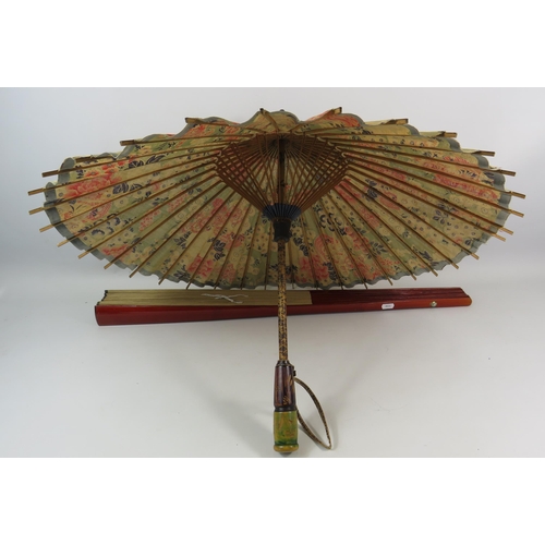 488 - Large chinese handpainted fan approx 75cm long plus a vintage parasol.