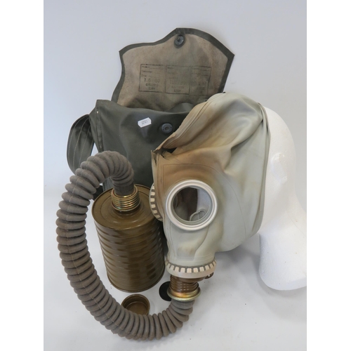 699 - Vintage Gasmask with Canister and bag. (rubber has perished to top of gasmask) see photos.