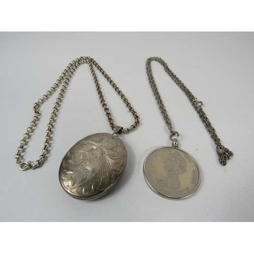 716 - Very large Sterling silver locket on a 58cm Belcher chain total weight 47.3g, locket 5.3cm by 4.5cm.... 