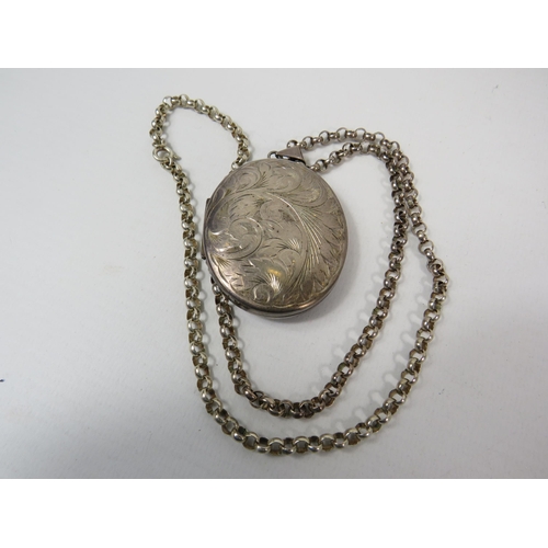 716 - Very large Sterling silver locket on a 58cm Belcher chain total weight 47.3g, locket 5.3cm by 4.5cm.... 