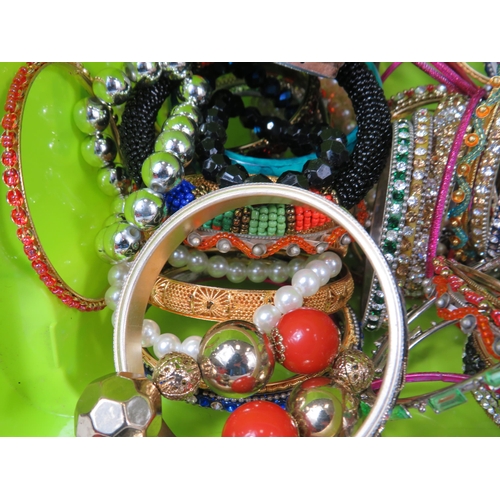 718 - Large quantity of costume jewellery bracelets.