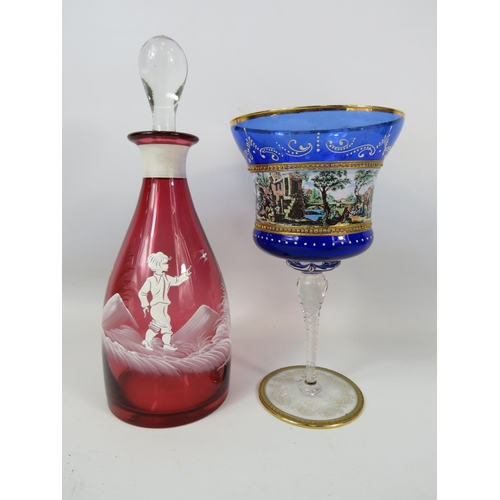 738 - Mary Gregory cranberry glass decanter and a large Murano cobalt blue glass chalice.