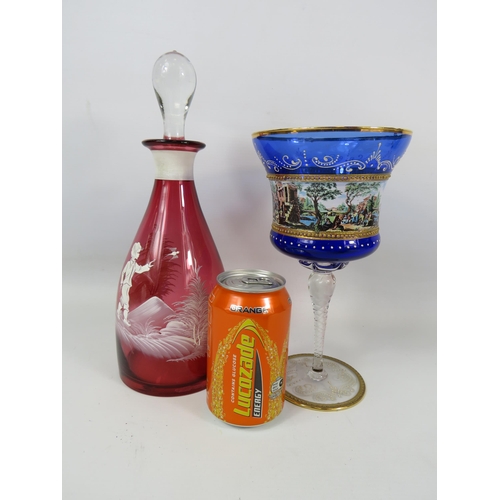 738 - Mary Gregory cranberry glass decanter and a large Murano cobalt blue glass chalice.