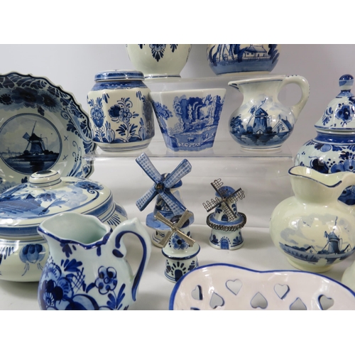 1057 - Large selection of various Delfts pottery.