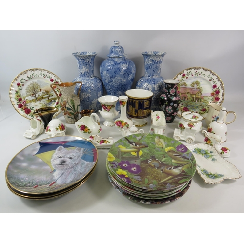 1066 - Mixed ceramics including Royal Albert plates, Cottage rose ornaments etc (the large blue and white v... 