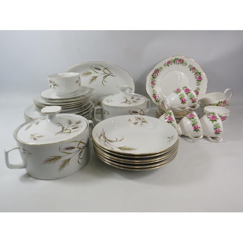 1067 - Colclough roses part teaset and a Winterling German part dinner set.