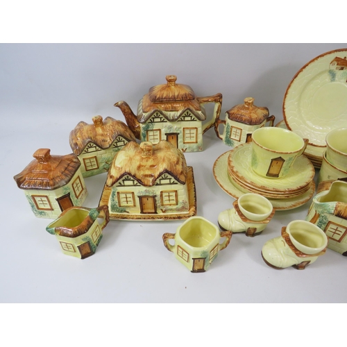 1068 - Large selection of Keele st pottery cottage ware, teaset, butte rdish etc.