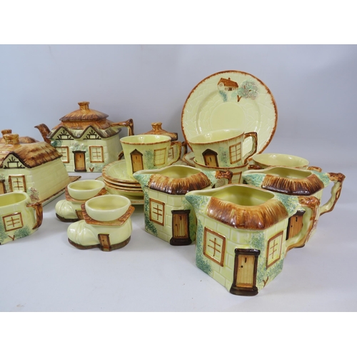 1068 - Large selection of Keele st pottery cottage ware, teaset, butte rdish etc.