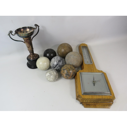 1072 - Mixed lot to include a barometer and thermometer, Silver plated trophy and 7 polished stone balls.