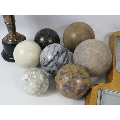 1072 - Mixed lot to include a barometer and thermometer, Silver plated trophy and 7 polished stone balls.