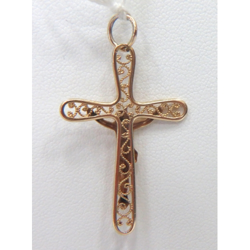 868 - 9ct Yellow Gold Crucifix Pendant which measures 38mm long weighs 1.3g