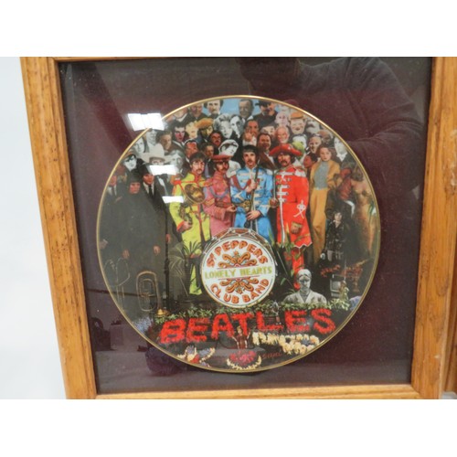 867 - Three limited Edition plates to include Sgt Pepper 25 Anniversary plate, Elvis Presley 68 Comeback S... 