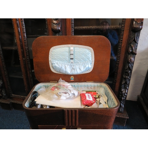 1153 - Retro wooden sewing table with contents.