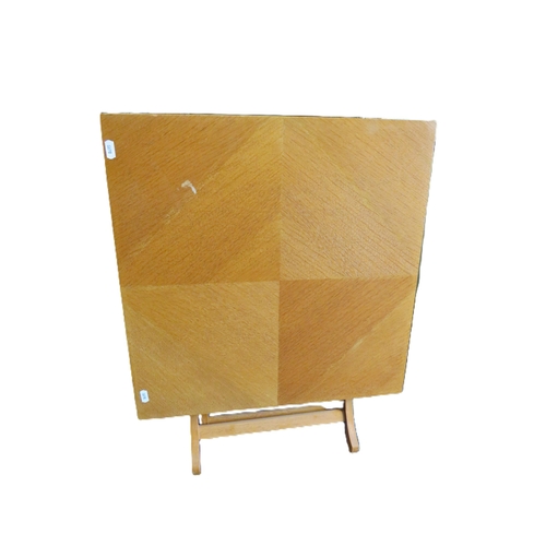 1154 - Teak folding table, the top measures 52cm by 52cm and 46cm tall.