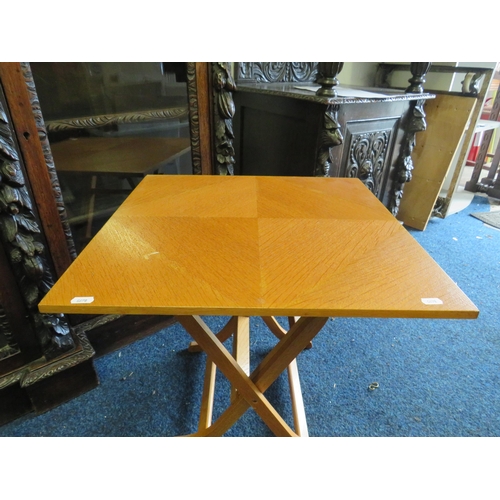 1154 - Teak folding table, the top measures 52cm by 52cm and 46cm tall.