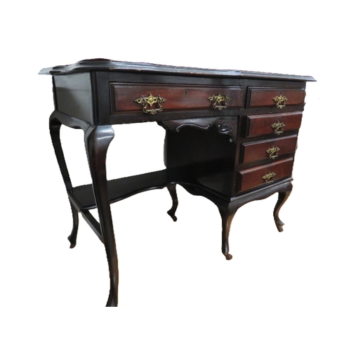 1141 - Kneehole writing desk with a bank of Drawers to the right hand side with kneehole to the left.  Red ... 