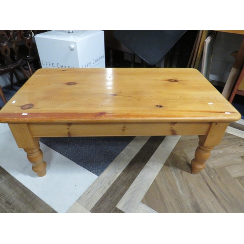 1144 - Attractive Studily built low pine table on chunky turned legs.  H:20 x W:48 x D:26 Inches. See photo... 