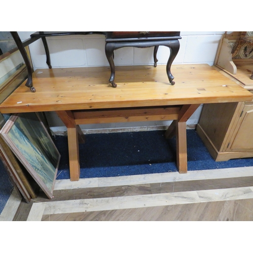 1146 - Pine Table with 'X' Frame end supports.  Measures approx H:30 x W:60 x D:26 Inches. See photos.   S2