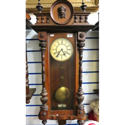 70 - Oak Case Wall Clock with enamelled Dial. Carved Eagle to pediment.  Working order with key.