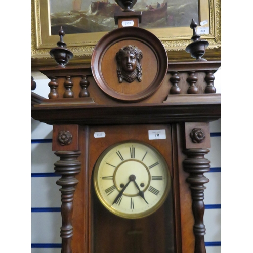 70 - Oak Case Wall Clock with enamelled Dial. Carved Eagle to pediment.  Working order with key.