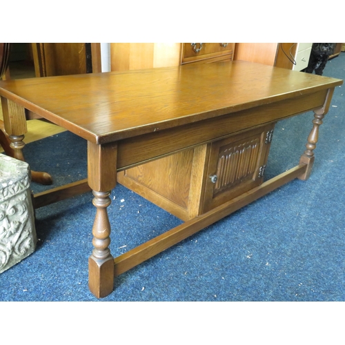 1342 - Old Charm low table with handy central cupboard with linen press decoration to cupboard door.  In Ex... 