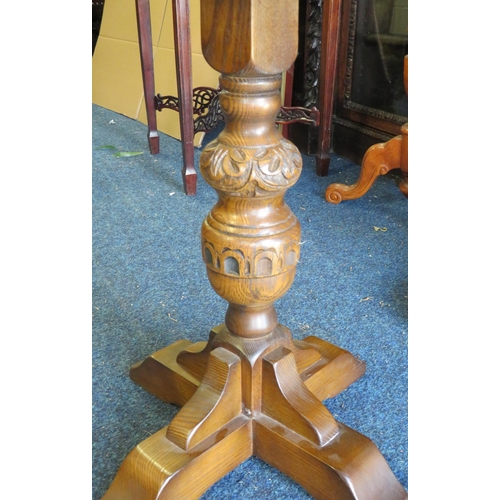 1344 - Old Charm Oak Low Circular Table with four legged base and turned and carved central column. In exce... 