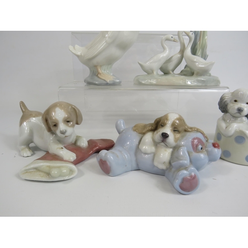 12 - 5 Nao figurines Puppies and Geese. The tallest been 15cm.