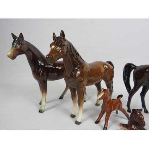 22 - Selection of horse figurines including Beswick and West German.