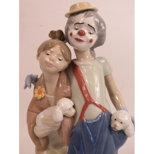 27 - Lladro Clown and girl figurine model no 7686, 22.5cm tall with box.