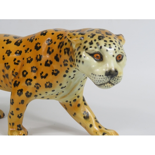 39 - Beswick Leopard figurine, approx 12cm tall & 30cm long.