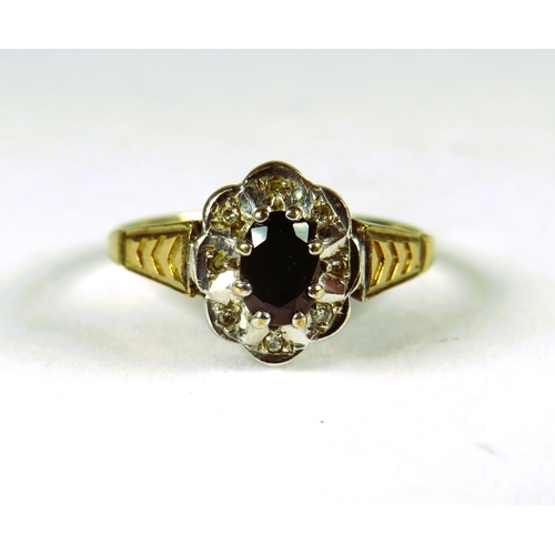 299 - 9ct Yellow Gold Ring set with a Central Sapphire with small diamond set surround .  Finger size 'N-5... 