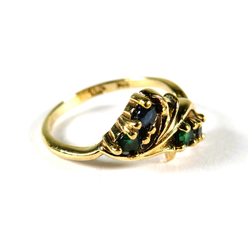 315 - 9ct Yellow Gold Ring set with Four sapphires in a leaf pattern.  Finger size 'K'   1.9g