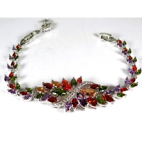 323 - 925 Silver Bracelet, 8 inches with detachable extension. Set with Synthetic Garnet/Topaz/Amethyst Mu... 