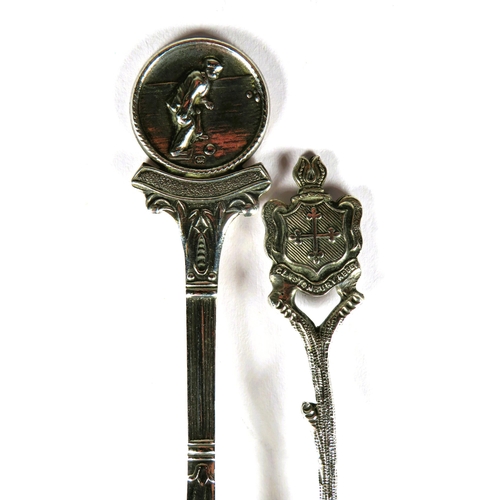 336 - Two Interesting collectable Silver teaspoons.   Total weight 21.9g.  See photos.