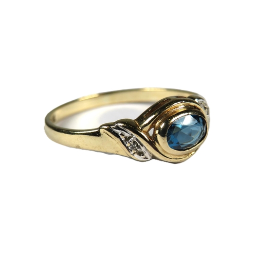 339 - 9ct Yellow Gold Ring set with a central Oval Topaz with Diamonds to shoulders.  Finger size 'O'   1.... 