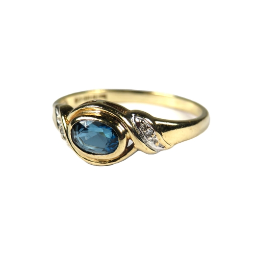 339 - 9ct Yellow Gold Ring set with a central Oval Topaz with Diamonds to shoulders.  Finger size 'O'   1.... 