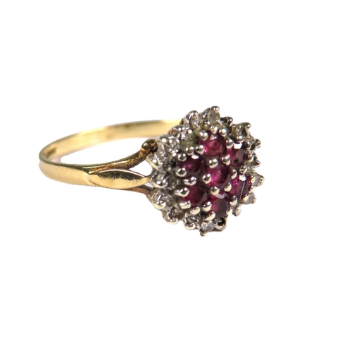 342 - 9ct Yellow Gold Ruby & Diamond Cluster set in a flower pattern.   Finger size 'O'   2.1g